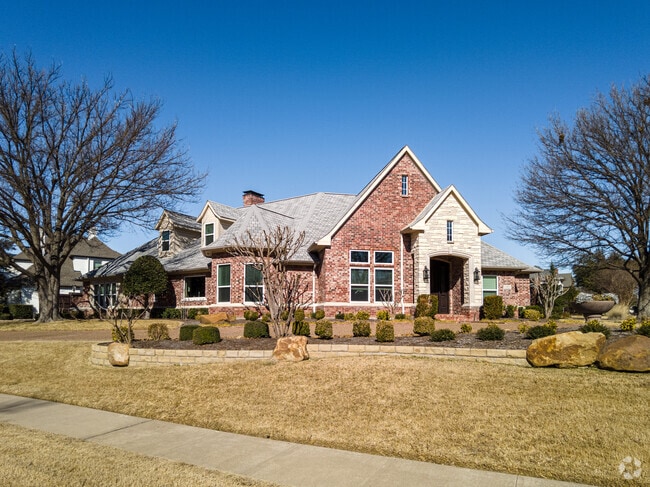 Well-manicured lawns are a frequent sight in the Spring Creek
neighborhood.