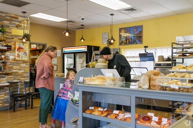 Enjoy fresh morning essentials at Trompeau Bakery, conveniently located at Cushing Park.