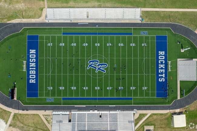 The Robinson Rockets are the local high school's football team.