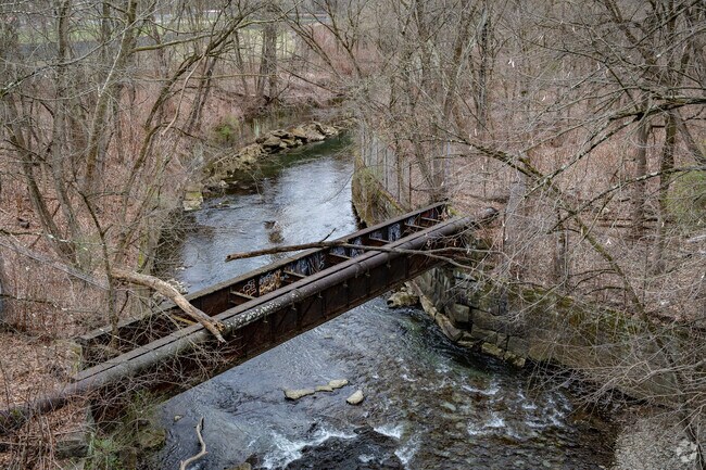 Turtle Creek flows under the Trafford bridge and throughout the neighborhood of Trafford.