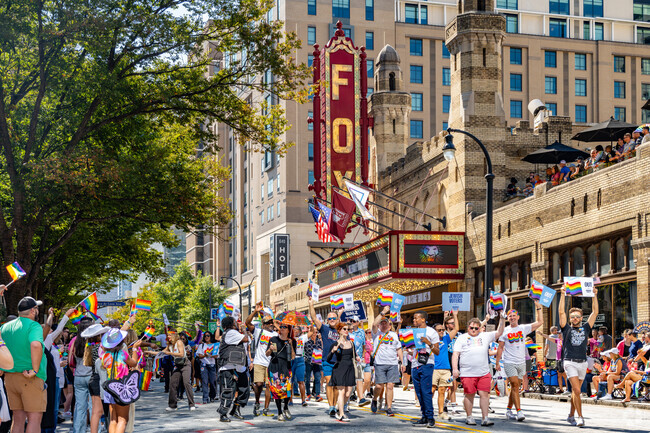 The annual Atlanta Pride Parade marches down Peachtree St to Piedmont Park, in Midtown Atlanta.