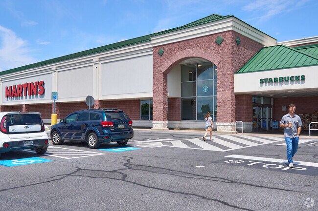 Shoppers visit Martin’s and Starbucks along Pennsylvania Avenue near Fountainhead-Orchard Hills.