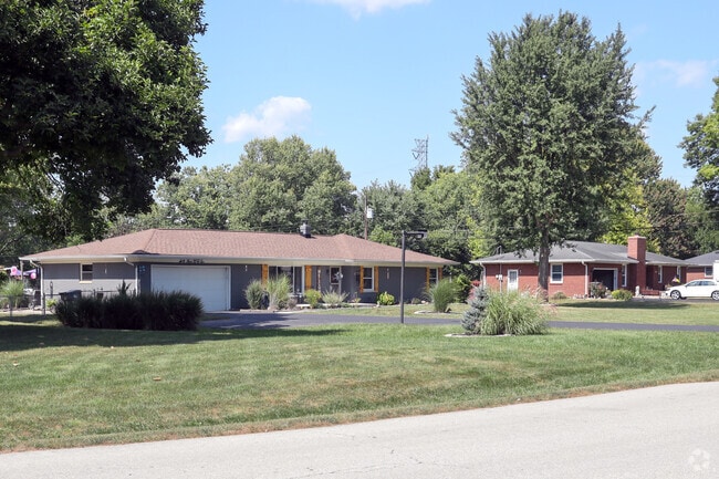 Homes in Homecroft are primarily single-family residences, and many have large front lawns.