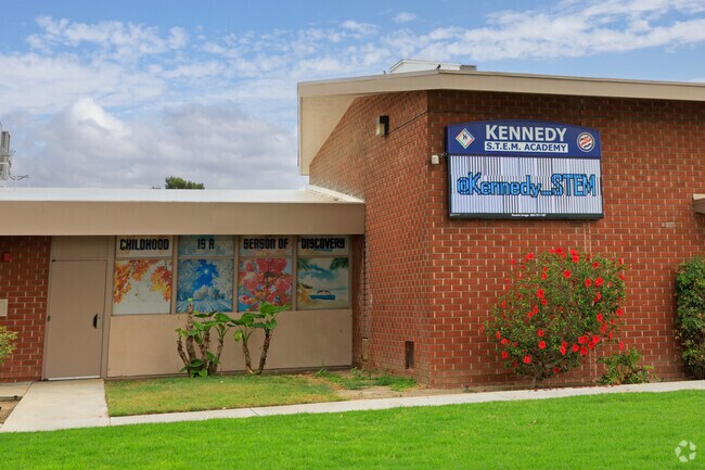 Kennedy STEM Academy signage displays school updated and news.