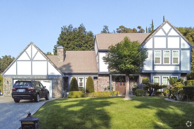 Large estates like this Tudor influenced home can be found in the hills of Colton.