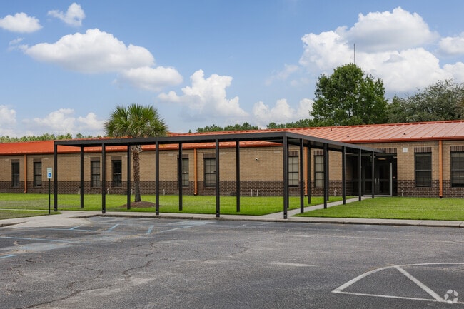 Timberland High School has covered pick up and drop off areas for students.