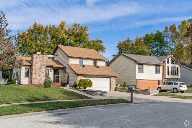 Well-kept flowerbeds and lawns in MANA show the pride residents take in their homes.