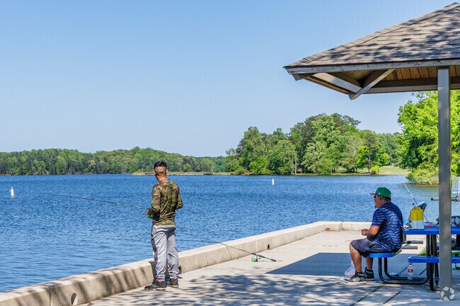 Enjoy a peaceful afternoon fishing on Oak Hollow Lake in Johnson Street Park.
