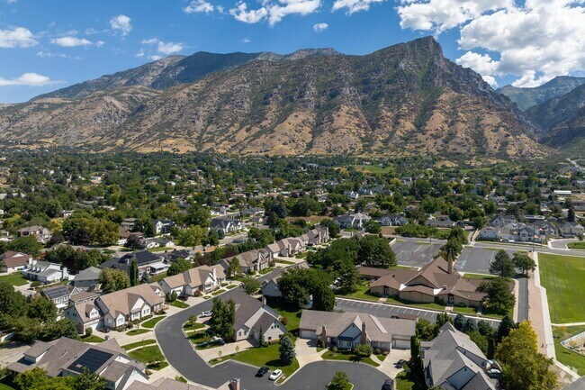 An aerial view of Rock Canyon shows a beautiful community by the mountains.