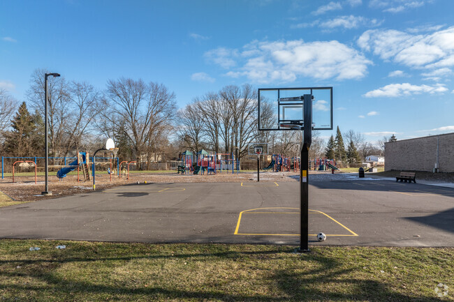 Wass Elementary School basketball court and playground.
