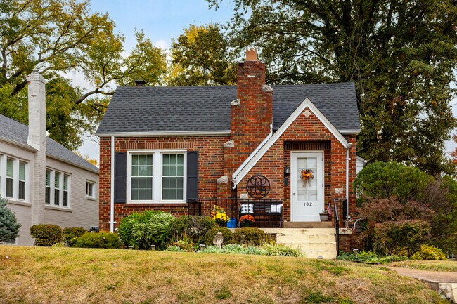 A small brick bungalow with tudor influences adds to the array of home styles in Kirkwood.
