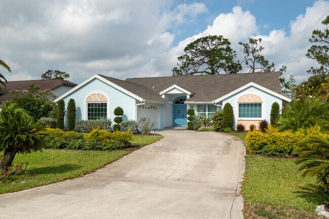 The creative flair of residents is evident in the style of the landscaping in the Council neighborhood in Bonita Springs, Florida.