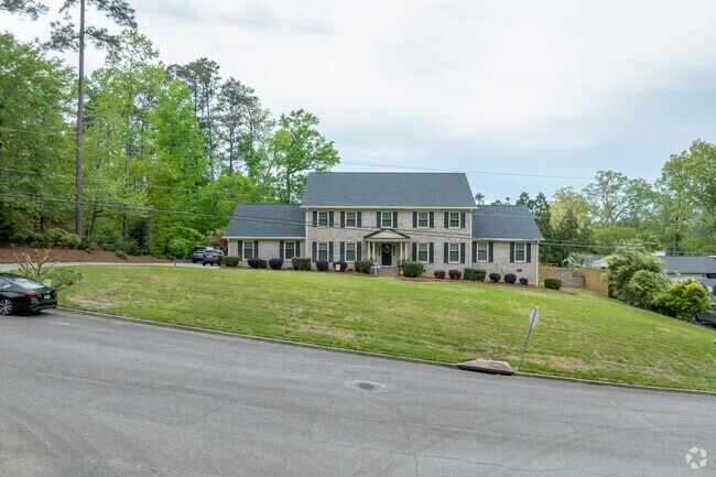 Colonial-style homes set back on a large lot make an impressive visual statement.