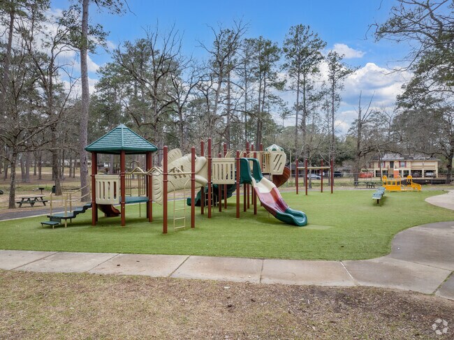 Kees Park in Pineville features colorful playgrounds for younger residents.