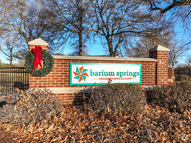 The brick signage at Discovery Program at the Springs in Statesville.