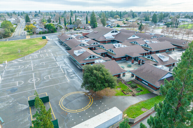 Play basketball at Carriage Drive Elementary School.