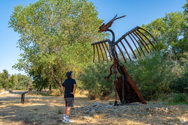 Nur Pon Open Space in Bechelli is a popular hiking spot by the river.