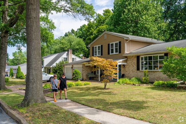 Families enjoy walking together on Colonial Park’s quiet, sidewalk-lined streets.