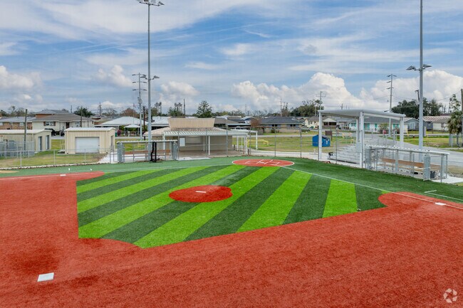 Hit the ball field at the Larose Regional Park and Civic Center for a fun game.
