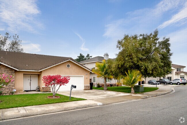 Beautiful foliage and gorgeous front lawns line the streets of Pomona Valley, California.