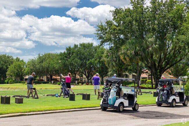 Arrowhead-Island Walk golfers can practice their swing on the driving range.