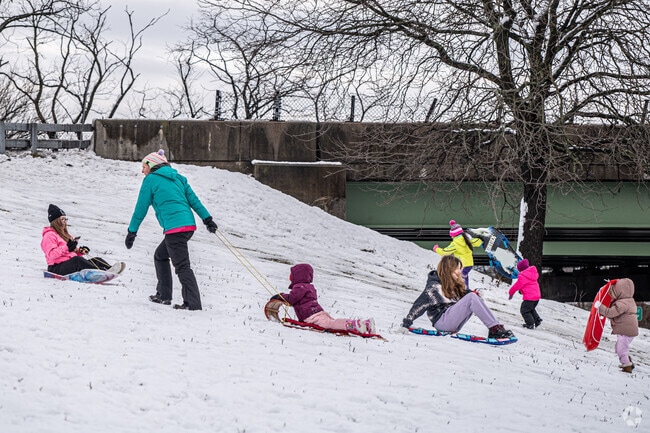 Families from Brightwaters enjoy the slopes on snowy days.