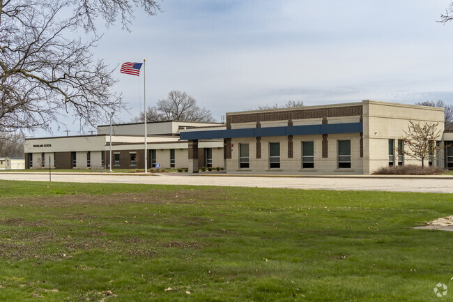 Woodland Elementary School features a well-maintained playground for students to enjoy.