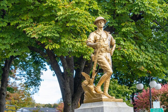 A golden solider statue in Townsend Park honors those who have served in the military.