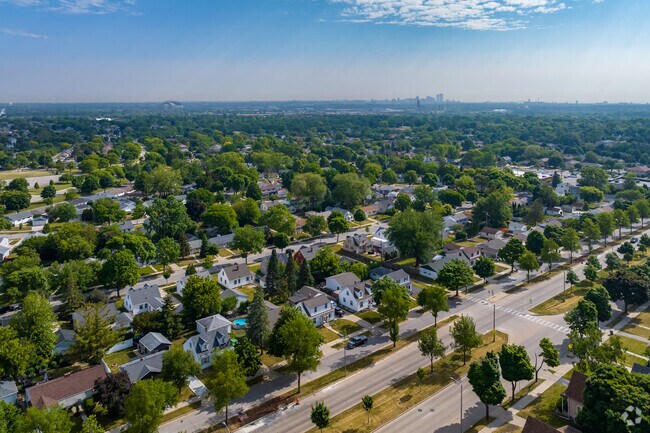 An aerial view of the Fairview neighborhood and downtown Milwaukee in the distance.