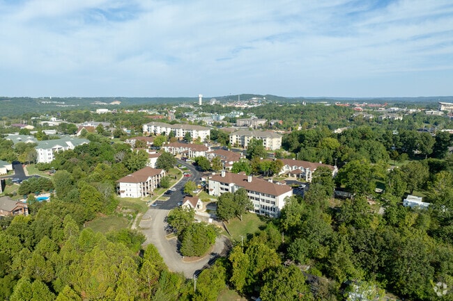 South Branson features a variety of houses and apartments, surrounded by lush greenery and a cool lakeside lifestyle.