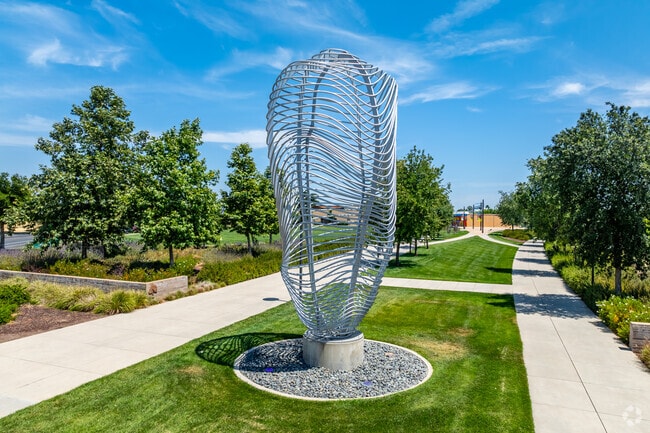 The Cloud Fountain sculpture is located at the entrance of The Preserve at Disctrict56.