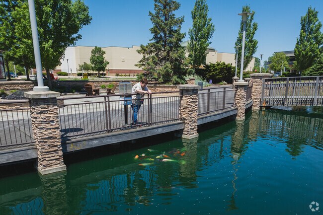 The Shops at Fallen Timbers offers a place to relax and feed the fish.