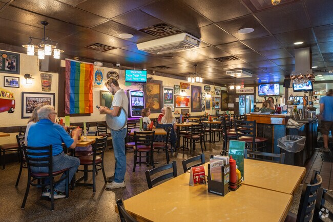 Come for happy hour at the Peanut Barrel less than 0.5 miles from the Downtown East Lansing, MI.