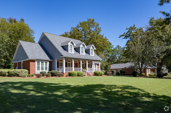 Large homes in Saint Andrews feature deep front porches.