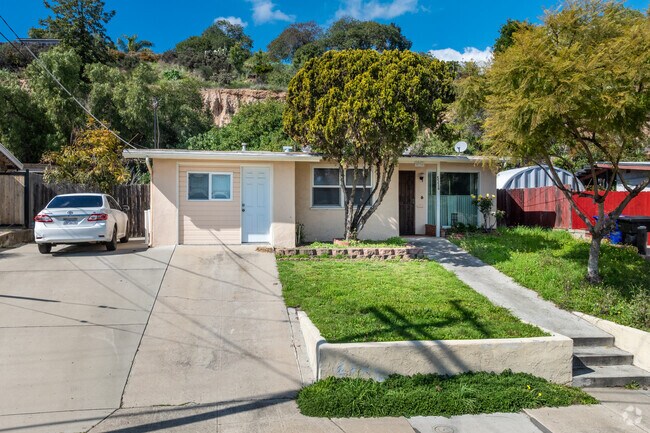 Single-story homes with steep driveways are found in Chollas Creek.
