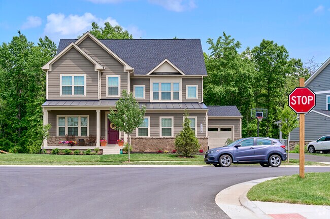 New Traditional homes with 4-6 bedrooms sit on Willowsford’s tree-lined streets.