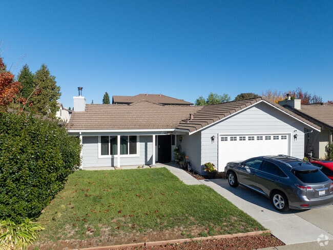 Classic ranch-style home in Gilroy featuring a wide front yard and open plan.