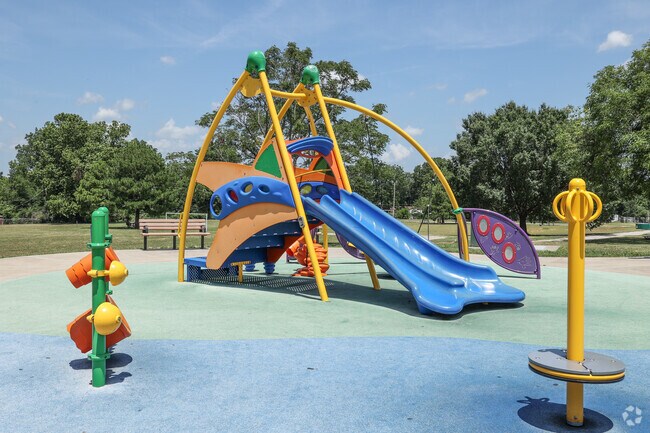 Smaller kids can play on the small slide that moves slower for added safety at Springdale Park.