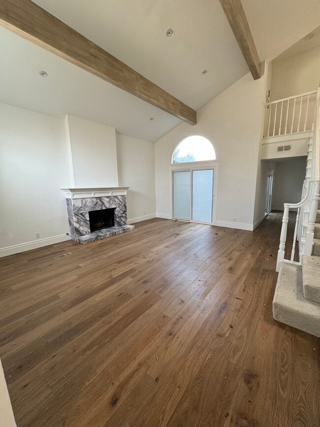 Family Great Room with beautiful stone fireplace