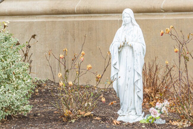 Religious decorative figurines surround St. Michael Catholic School.