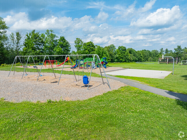 There are multiple play areas surrounding Sebasticook Valley Elementary School.