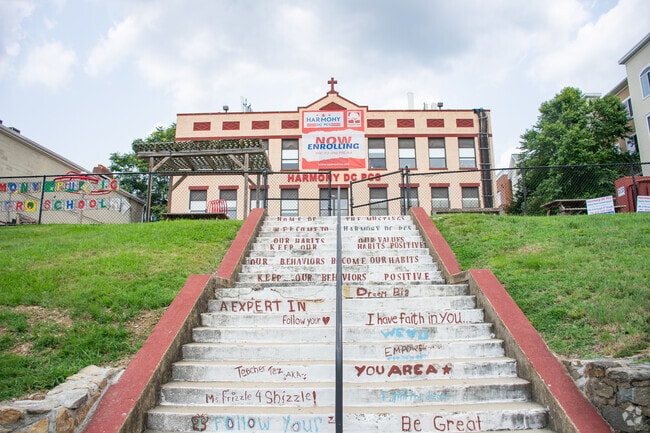 Harmony DC Public Charter Schools features messages from students along the stairs.