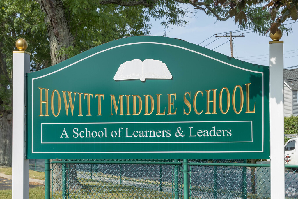 Signage on the street identifies the Weldon E. Howitt Middle School in Farmingdale, NY.