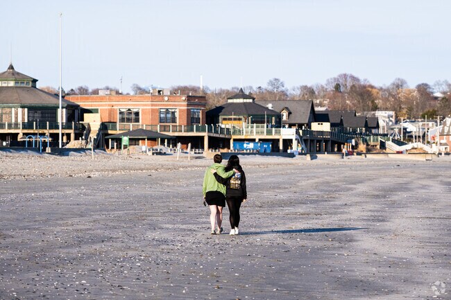 Enjoy a sunset walk along one of Newport's famous beaches near Fifth Ward.