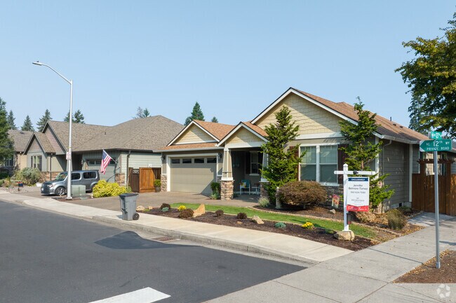 Single-family homes on NE 12th Way often list in the $350K–$550K range.