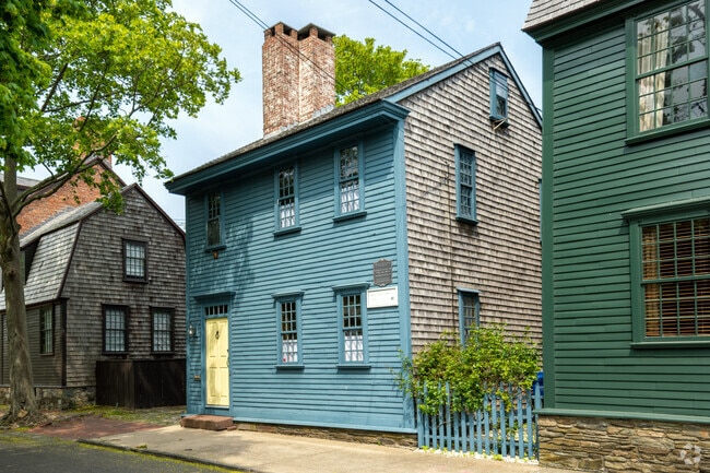 This early 18th century colonial home is nestled among other historic homes in Newport, RI.