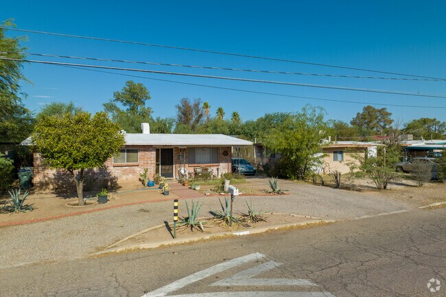 A picturesque row of traditional brick homes lines the streets of North Dodge.