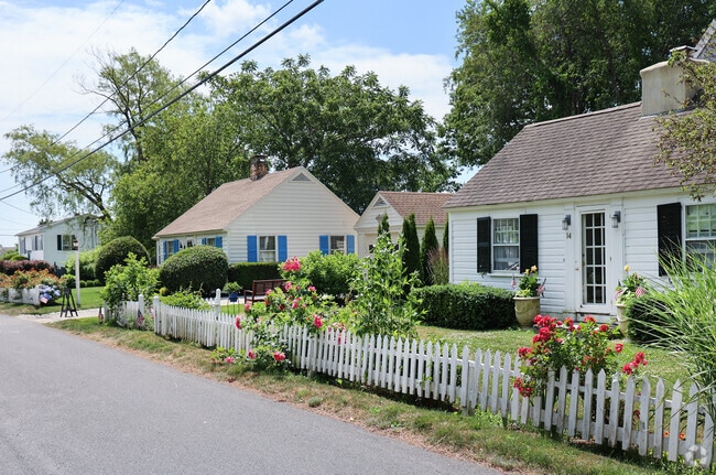 Smaller homes near the beach in Rye are often used as summer rental properties, offering visitors cozy accommodations just steps from the shoreline during the busy vacation season.