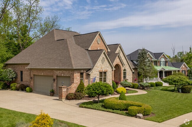 The Rosewood subdivision in White Oak features meticulously manicured lawns.