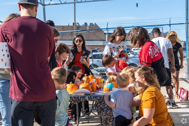 Young children have a blast at Pumpkin Decorating at Fleet Farm in Germantown, near Lisbon.